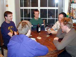 Andrew, Marty, Doug, Dan, and Richard enjoy a game of High Society. Note Doug's Bad Apple.