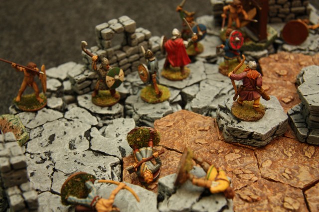 A deadly melee between the warband and barbarians