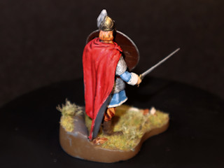 King Arthur figure seen from the back